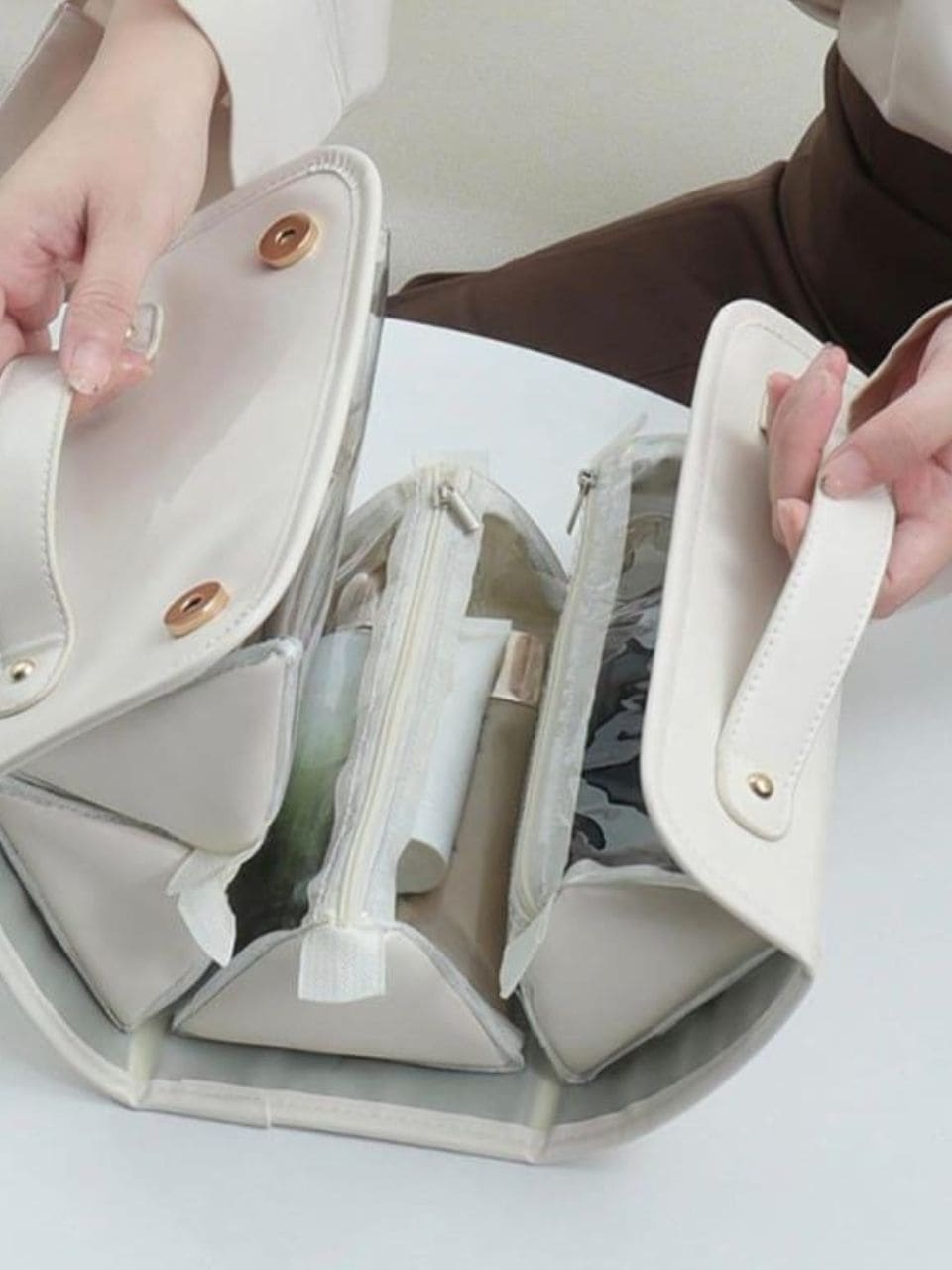 Waterproof makeup organiser with compartments.